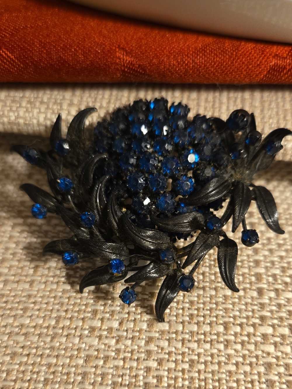 Vendome RARE Brooch With Blue Stones And Japanned Leafy Setting